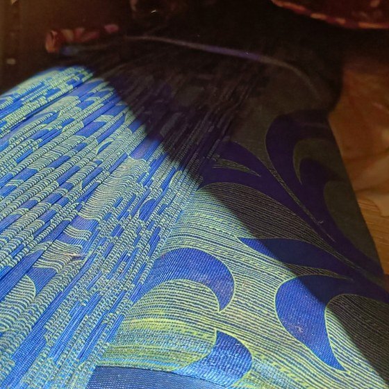 Blue and green patterned upholstery fabric